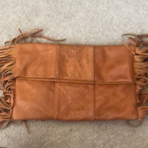 Elf handmade leather clutch